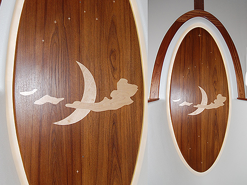 Some of the mariner's favorite celestial sights as beautiful teak inlays.